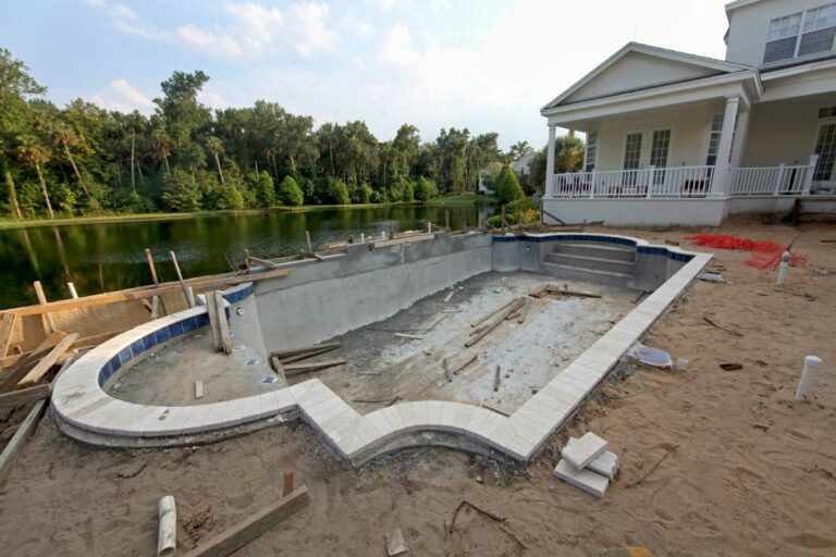 A back yard pool under construction for renovations.